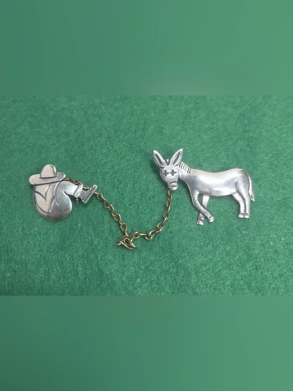 Sterling silver siesta man with donkey pin- signed- 925